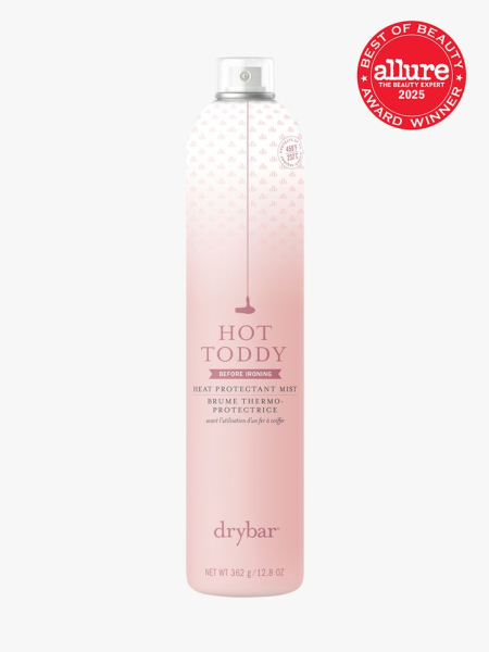 Drybar Hot Toddy Heat Protectant Mist in branded pink gradient aerosol bottle on light gray background with red Allure Best of Beauty seal in the top right corner