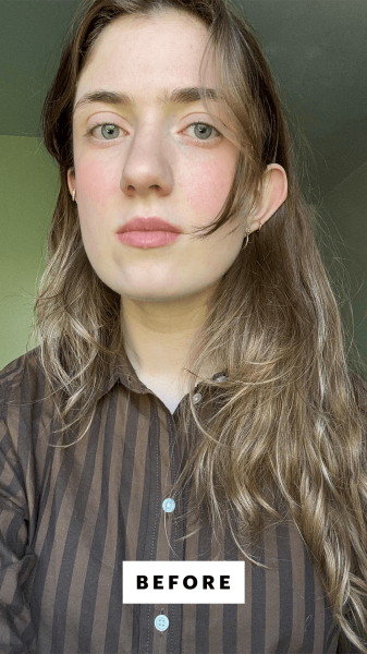 Blackman before applying the Gisou Honey Infused Lip Oil in Mango onto her lips