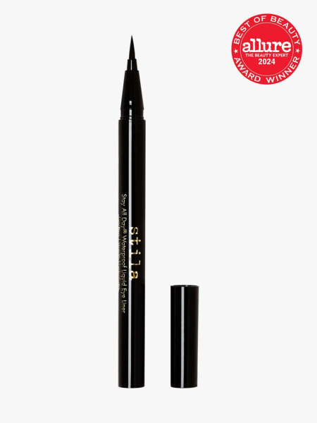 Stila Stay All Day Waterproof Liquid Eye Liner in black with gold accents on a light gray background with red Allure Best of Beauty seal in the top right corner